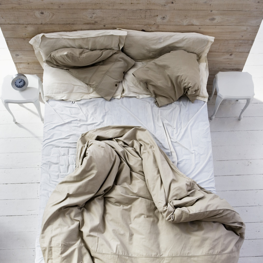 Unmade Bed --- Image by © Royalty-Free/Corbis